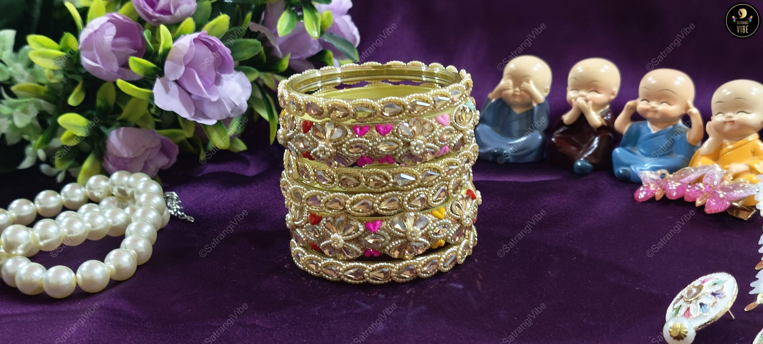 Set of Six Gold Colored Heart Bangles