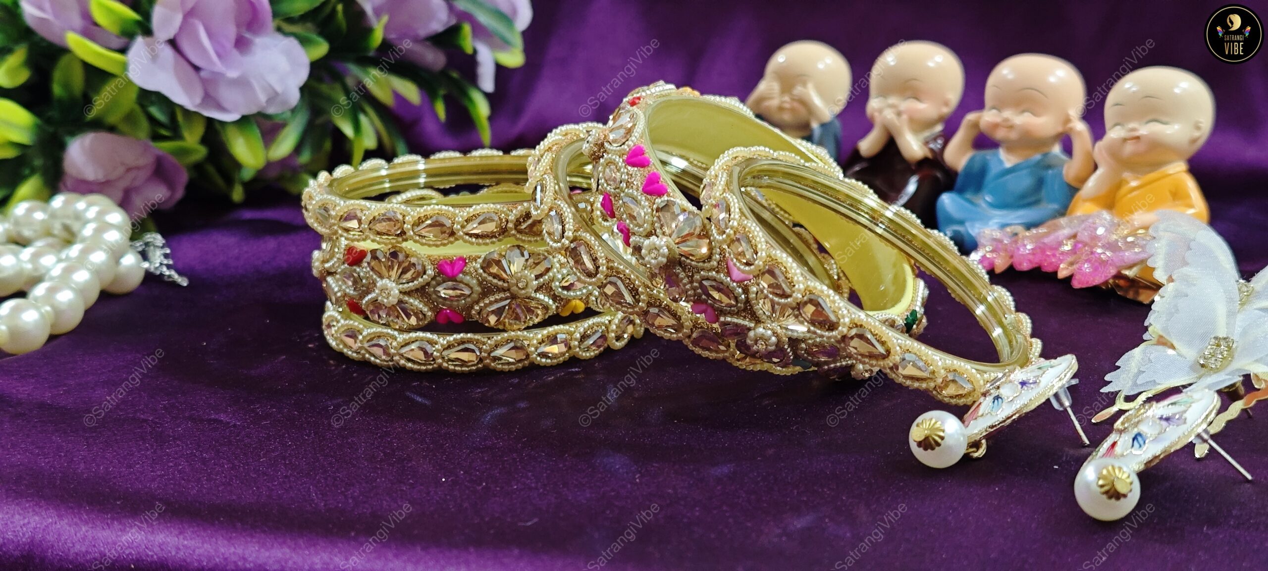 Set of Six Gold Colored Heart Bangles - Image 2