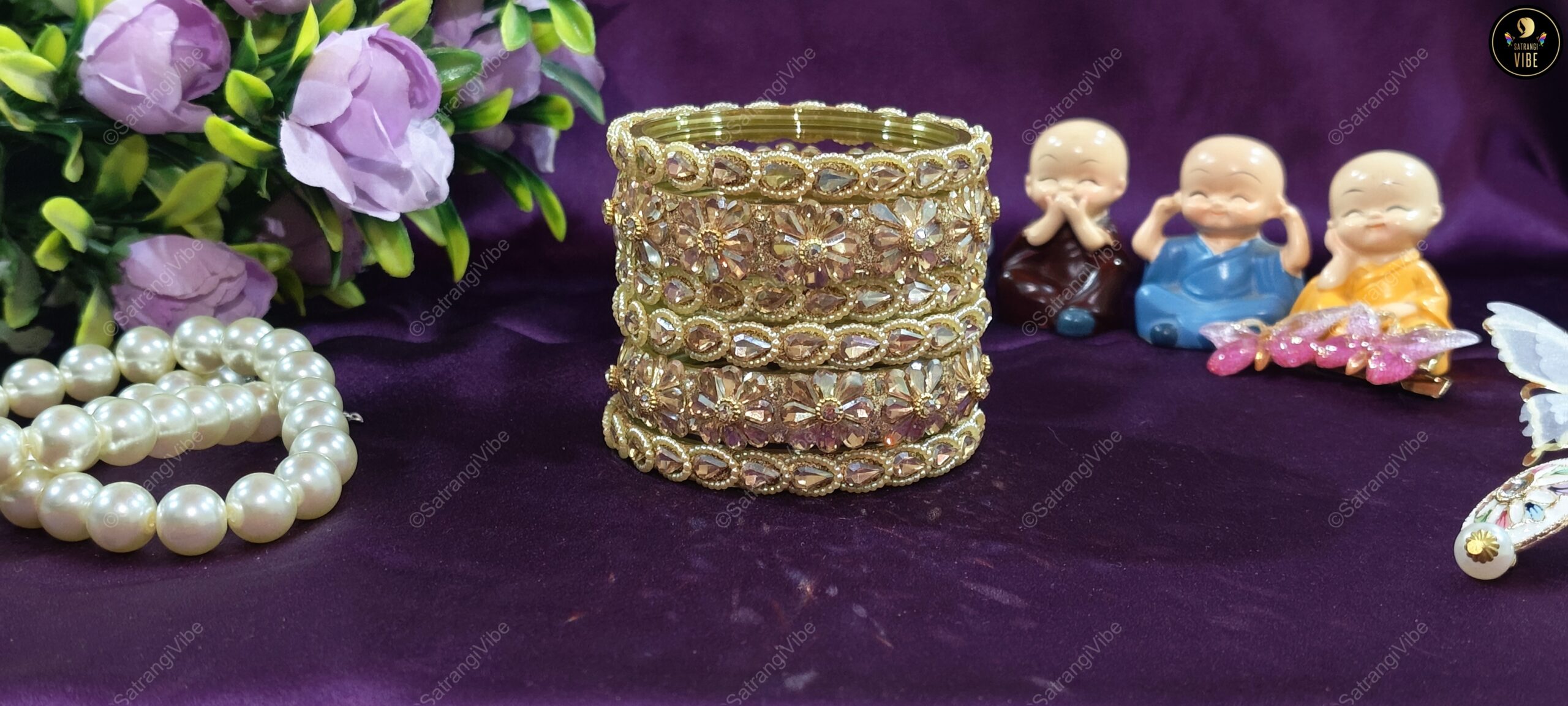 Set of Six Golden Flower Bangles