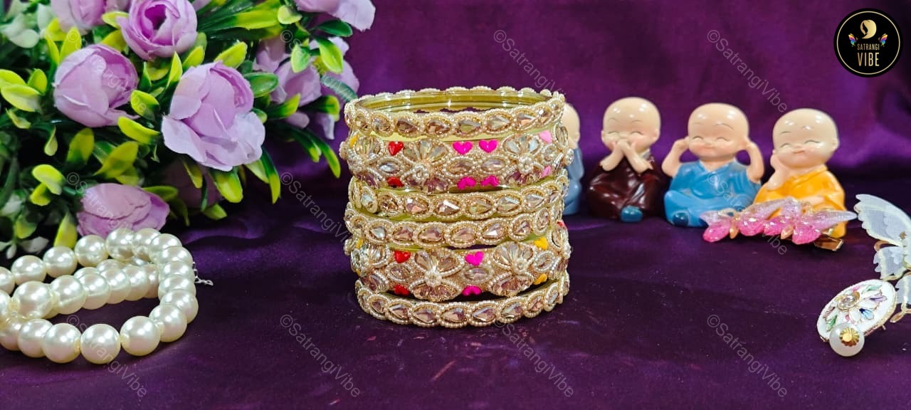Set of Six Gold Colored Heart Bangles Set